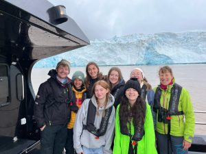 This is a photo of me and some of my classmates at a glacier in Svalbard!